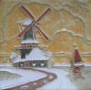 Molen in winterlandschap